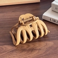 Large matte caramel hair claw clip for thick hair with a sleek wavy design - Pumpkin Yellow