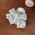 Sweet acetic acid bow hair claw clip with green and white marble texture on wood - Yellow-Green