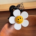 Cute white flower hair claw clip with yellow smiley face and black lace bow detail - 4.2cm / Smiling Flower