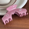 Morandi pink hair claw clip with sweet heart and bow doodle patterns on dark wood - Rose Red Arch Shape