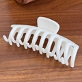 Matte white soft silicone hair claw clip in large size for thick hair on wood background - Shark Clip-White