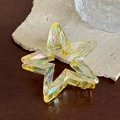 Holografische sternförmige Haarklammer aus Acetat in lichtdurchlässigem Gelbgrün - Stern Irisierendes Gelb (6.9cm)