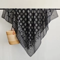 Close-up of cotton-linen shawl with white floral paisley prints and short fringe edges - 130x130cm / Black