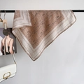 Bohemian paisley square silk scarf in brown and cream colors hanging on metal rack - Khaki / 68x68cm