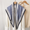 Elegant blue paisley silk triangle scarf worn as a shoulder wrap over a white shirt - 87*130CM / Blue