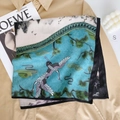 Detail of velvet scarf featuring flying crane motifs on high-quality silk fabric - Blue