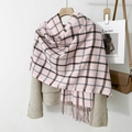 Detail of pink plaid scarf with black and gray checks and long fringes on beige coat - 70*180+20 / Pink