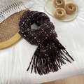Detail view of a thick plaid cashmere-feel scarf with long tassels and autumn decor - 180cmx65cm / Coffee