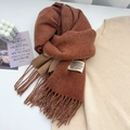 Soft caramel cashmere-like winter scarf featuring long tassels and a woven brand label - Brown Red