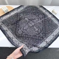Flat lay of navy blue paisley silk square scarf with elegant decorative patterns - 68*68cm / Black
