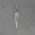 Vintage silver angel wing pendant with clear crystals on a textured grey fabric background - Pendant Only (No Chain)