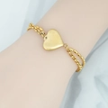 Bracciale dorato a doppio strato con ciondolo a cuore opaco su catene sovrapposte - Oro