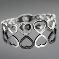 Elegante pulsera de corazón en acero inoxidable plateado con pavé de circonitas brillo - Plateado