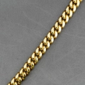 Chaîne à maillons cubains dorée pour homme avec finition polie sur fond de tissu sombre - 12mm Largeur 60cm Longueur