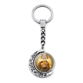 Silver rotating moon keychain featuring a detailed circular nativity scene pendant - Nativity Scene Style (XSWX9255-8)