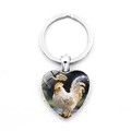 Close-up of heart-shaped keychain featuring a colorful white rooster and auspicious clouds - Rooster (XSWX9284-10)