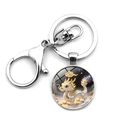 Detailed view of silver metal keychain with a cute dragon illustration in glass dome - Dragon (XSWX9289-5)