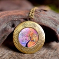 Macro shot of bronze Tree of Life locket necklace with colorful art on wood bark - Pink Orange Purple Gradient Style (XHXL0007)