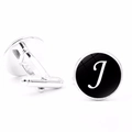 Detailed view of silver letter J cufflinks with black background and bullet back closure - Letter J