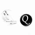 Detailed view of silver letter Q cufflinks with polished black dial and swivel post back - Letter Q