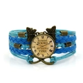 Handmade multilayer braided bracelet featuring blue leather, butterfly and clock charms - Blue