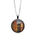 Detail of vintage library book pattern inside a silver glass pendant necklace - Silver