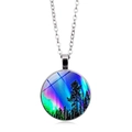 Detail of round pendant necklace featuring aurora borealis forest glass gemstone art - Aurora Forest Silhouette Style (ABXL351-7)