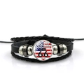 Close-up of Route 66 glass gem on a multilayered braided leather motorcycle bracelet - Flag Shield Logo Style (ABXL369-4)