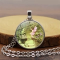 Vintage crystal pendant necklace with fairy and frog illustration on silver chain - Silver