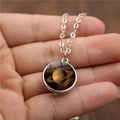 Collier en alliage argent avec pendentif boule de verre double face motif Saturne - Saturne