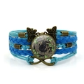 Vintage multilayer Wicca bracelet featuring a black cat cabochon and blue braided ropes - Blue