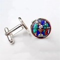 Macro view of silver-tone cufflinks featuring religious stained glass window art inserts - Religious Baptism Scene (XSWX1256-7)