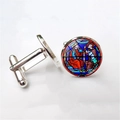 Detailed macro view of silver cufflinks featuring medieval stained glass art pattern - Figure Dialogue Art (XSWX1256-9)