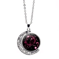 Luminous Scorpio necklace featuring a double-sided rotating moon pendant and silver chain - Scorpio