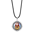 Detailed macro view of Matryoshka doll glass pendant with silver filigree frame - Red Green Painted Russian Doll Style 6 (PSXL0018-6)