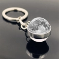 Detailed view of the realistic Moon surface texture within the glass moon keychain - Moon (PSXL001134-8)