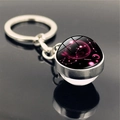 Scorpio zodiac double-sided glass ball keychain with celestial constellation design - Scorpio