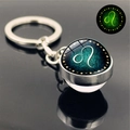 Portachiavi segno zodiacale Leone luminoso con sfera di vetro e anello in metallo argento - Leone