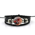 Macro detail of multilayer braided leather bracelet with Route 66 glass gem and beads - Vintage Car Route 66 Style (PSXL001195-5)