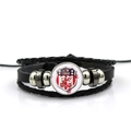Detail of multi-layer braided leather bracelet featuring New York Route 66 glass charm - New York 66 State Park Style (PSXL001195-15)
