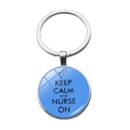 Détail du porte-clés en dôme de verre avec motif infirmière bleu et slogan - Style Keep Calm Infirmière (PSXL001409-5)
