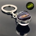 Detailed macro view of glow in the dark galaxy nebula glass ball pendant keychain - Galaxy 13 (PSXL001206-13)