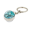 Teal dolphin pendant keychain with a crystal glass dome and silver metal split ring - Abstract Dolphin Pattern (PSXL001187-7)