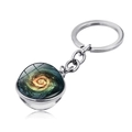 Macro shot of glass dome keychain showing colorful spiral galaxy and polished metal finish - Colorful Spiral Nebula Style (PSXL001467-5)
