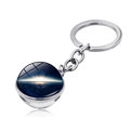 Detail view of double-sided glass ball keychain with galaxy nebula space patterns - Deep Blue Galaxy Starlight Style (PSXL001467-6)