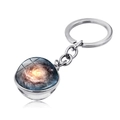 Macro detail of universe galaxy glass ball keychain with swirling blue space nebula pattern - Deep Blue vs Orange Yellow Spiral Style (PSXL001467-7)