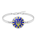 Macro shot of silver bracelet with Ukraine coat of arms pendant and adjustable chain detail - Blue Background Yellow Trident Style (XSWX4482-3)