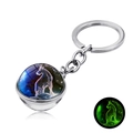 Portachiavi Capricorno luminoso con sfera di vetro bifacciale fosforescente al buio - Capricorno Luminoso