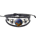 Macro detail of Halloween pumpkin glass gem and multilayered leather woven bracelet - Pumpkin Dead Tree & Stars Style (XSWX4804-7)