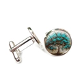 Detail of silver tree of life cufflinks with blue glass cabochon on a white background - Cyan Blue Tree Of Life (XSWX2737-7)